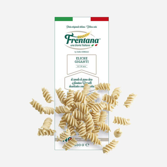 Packung Eliche Giganti Pasta aus Urgetreide, zeigt große spiralförmige Nudeln vor heller Verpackung mit italienischem Design.
