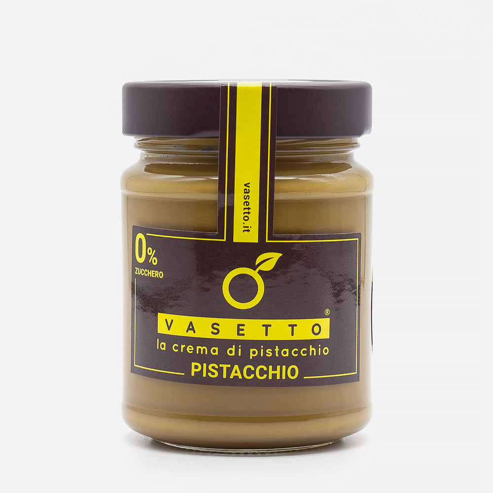 Ein Glas Vasetto Pistacchio-Aufstrich, 0% Zucker, gelbe und braune Etikettenakzente, betont den pistazien Geschmack.
